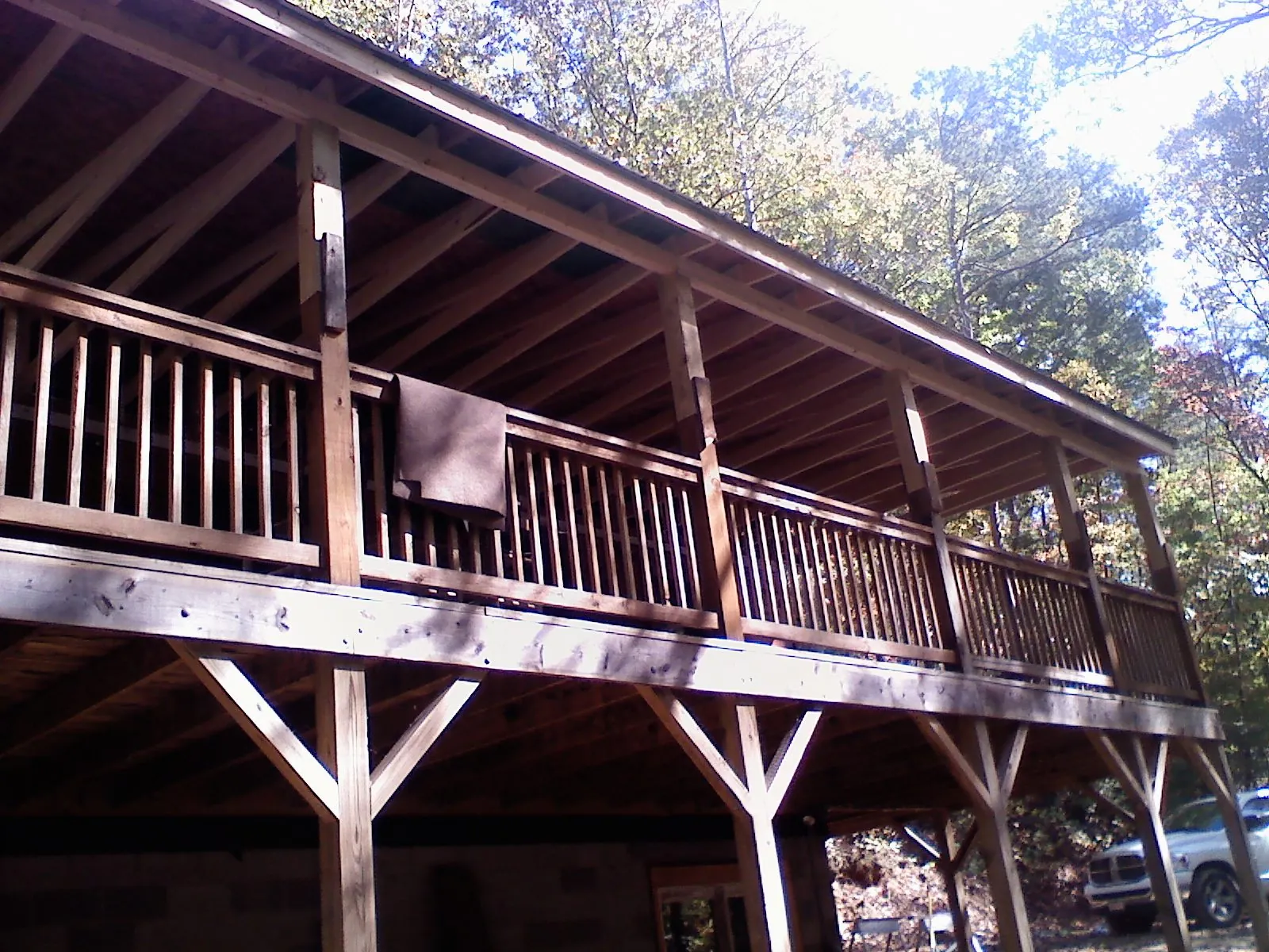 Timber framing under a new elevated porch and deck — Roof Leak Repair in Ronkonkoma by Roofing Brothers